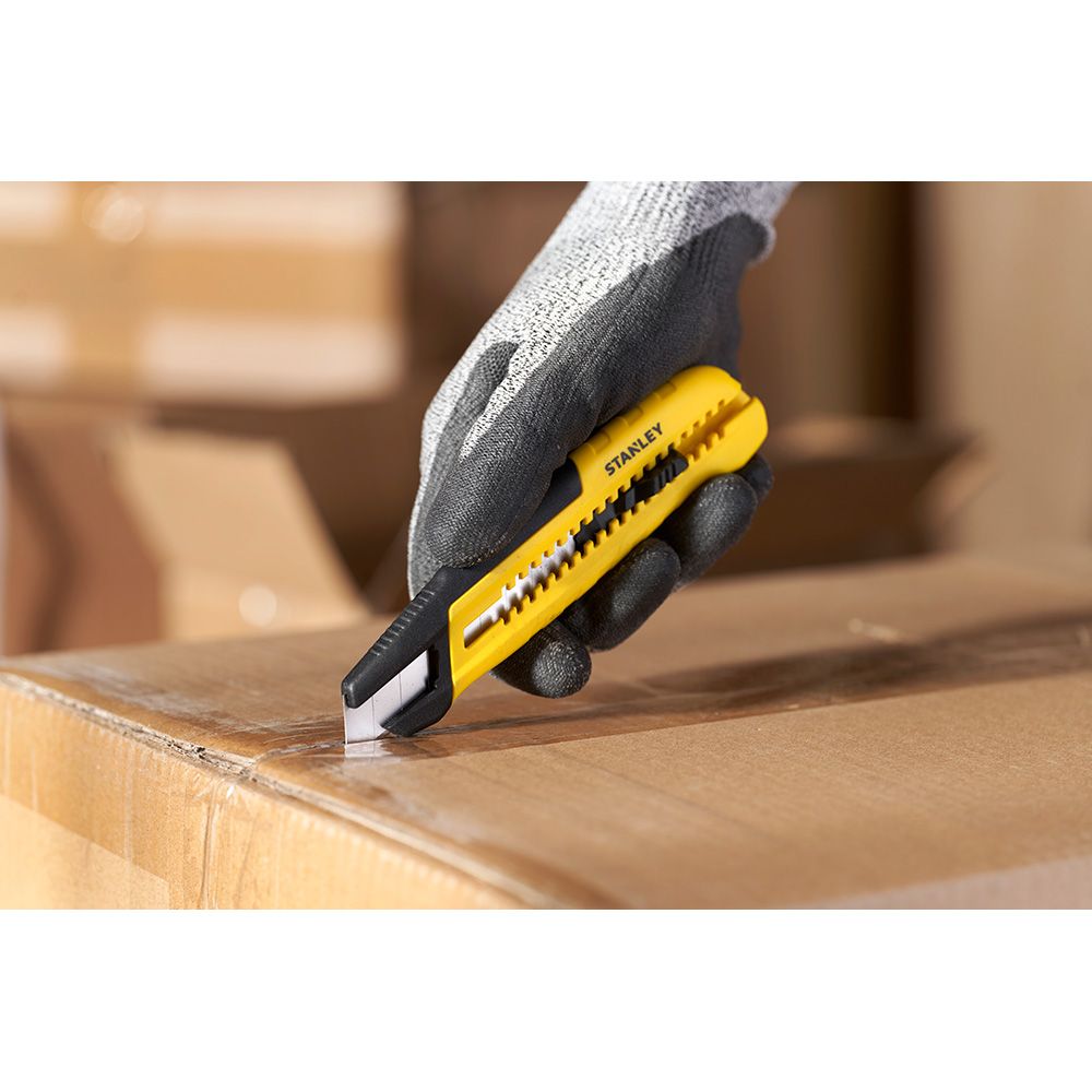 Cúter bi-material segmentación lateral con deslizador estándar 18 mm