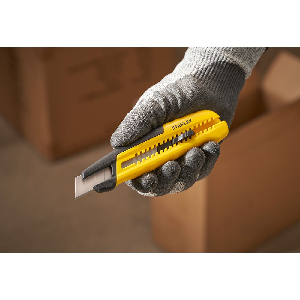 Cúter bi-material segmentación lateral con deslizador estándar 18 mm