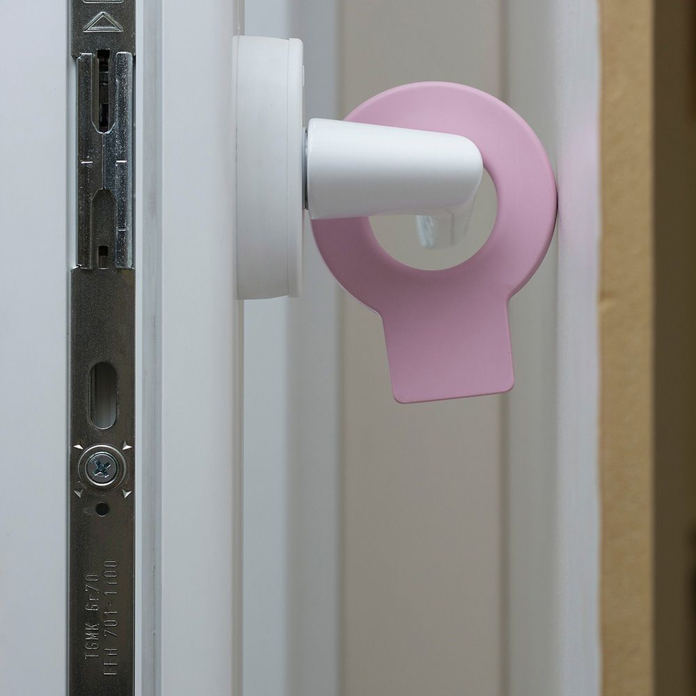 Retenedor de cuña para puerta colgable lock mod.660 de plástico rosa. rei
